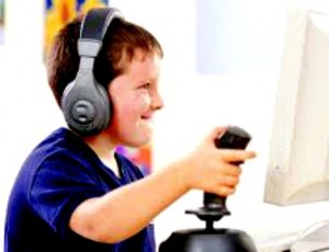 Boy With Headphones Playing Video Game
